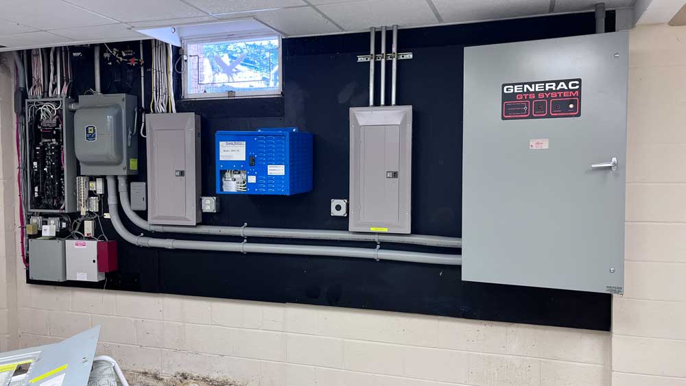 Electrical service board at a residential site with tools and equipment in Blairstown, NJ