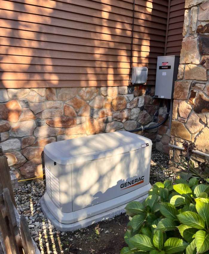 A Compressor Positioned in front of a House Highlighting Generator Repair in Blairstown, NJ