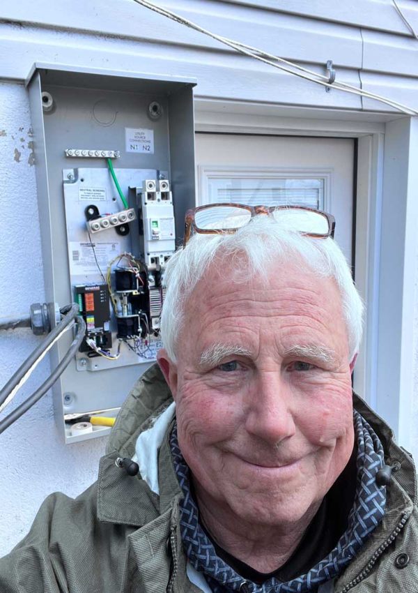 Electricians performing wiring work near a residential property in Blairstown, NJ