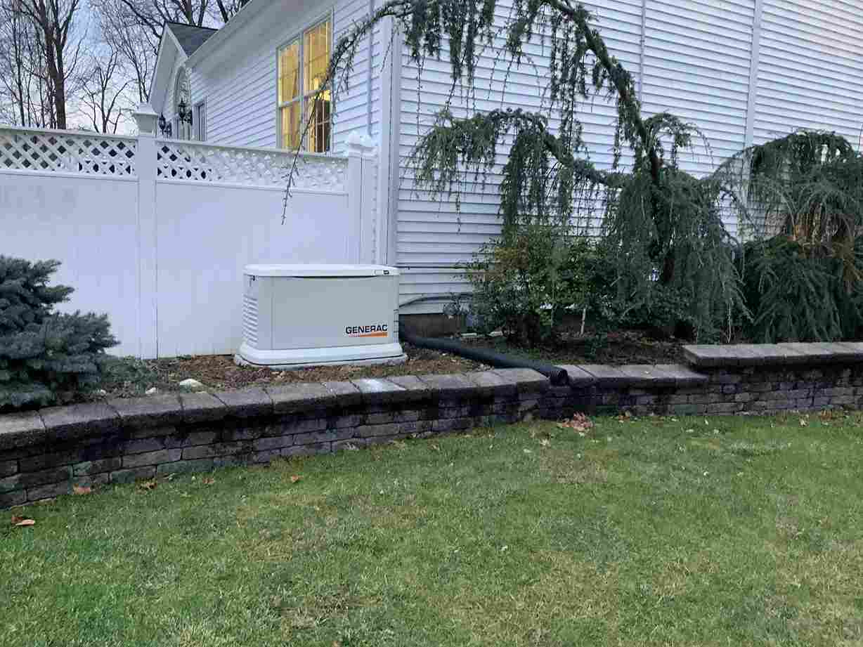 Close‑up view of a Generac home backup generator during maintenance in Blairtown, NJ
