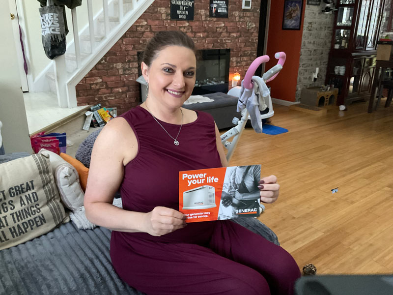 Happy customer holding Power you life flyer.