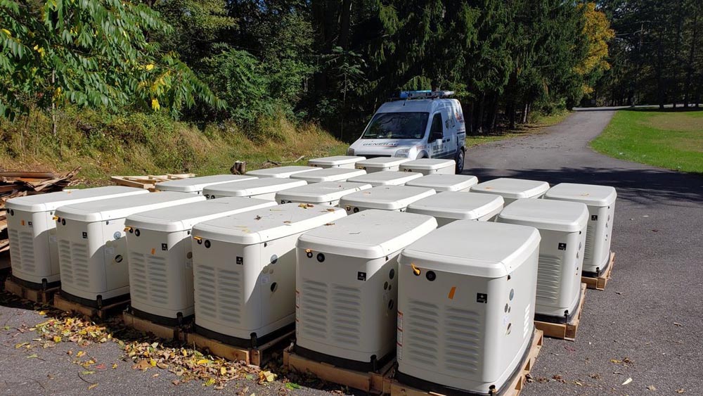 multiple generators sitting in driveway