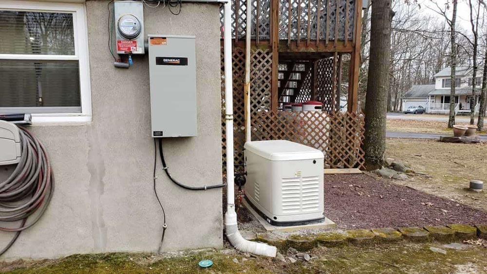 generator outside home by patio